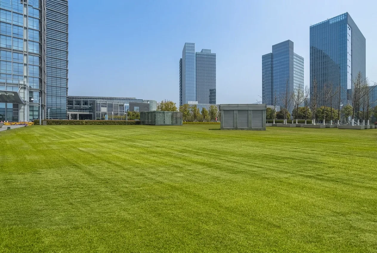 Freshly mowed commercial lawn in front of office buildings